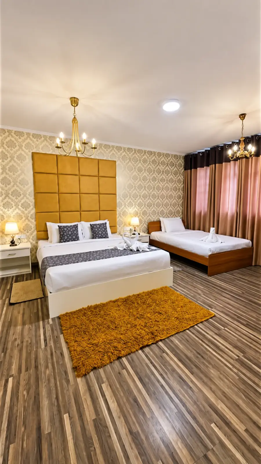 Triple room with beds and warm wooden finishes